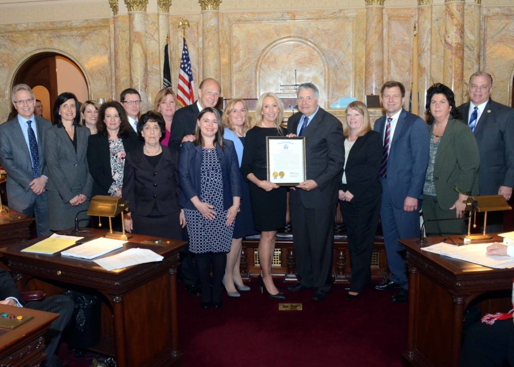 (Fourth from Right) Kim Soricelli taking part in the reception as Barnabas Health Corporate Care accepts their Resolution from the State of New Jersey.